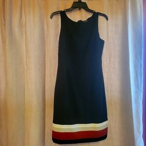 Gently used White House Black Market Dress size 6. Black, rust, and tan.